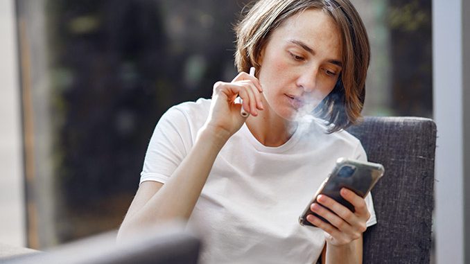 Photo by Gustavo Fring: https://www.pexels.com/photo/woman-smoking-while-holding-her-phone-4017434/
